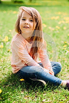 Little girl outdoors with long hair