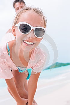 Little girl outdoors during summer vacation have fun with father