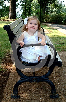 Little Girl on Park Bench