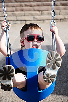 Little Girl at Park on swing