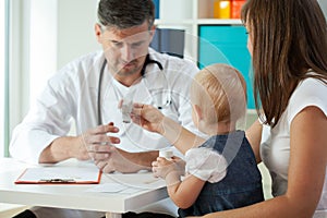 Little girl at pediatrician's office