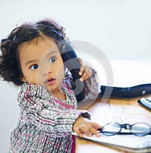 Little girl, phone and call play for imagine, communication or childhood funny joke. Female person, learning development