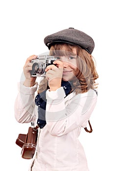 Little girl photographer with old camera