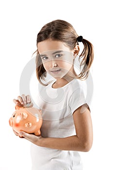 Little girl with a piggy-bank