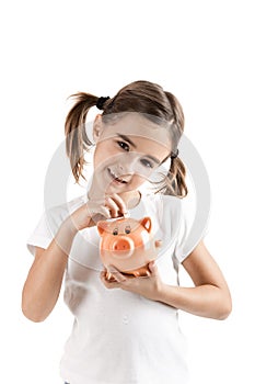 Little girl with a piggy-bank