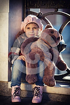 Little girl in a pink beret