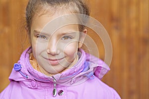 Little girl in pink coat