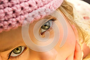 Little Girl in Pink Crochet Hat Close Up