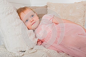 Little girl in a pink dress