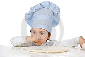 Little girl with pizza dough