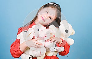 Little girl play with soft toy teddy bear. Sweet childhood. Collecting toys hobby. Cherishing memories of childhood