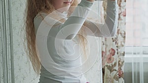 Little girl play with three-dimensional toy puzzle