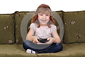 Little girl play video game