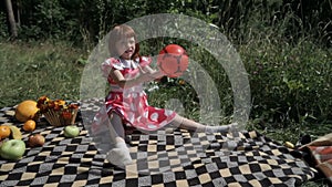 Little girl playing with ball