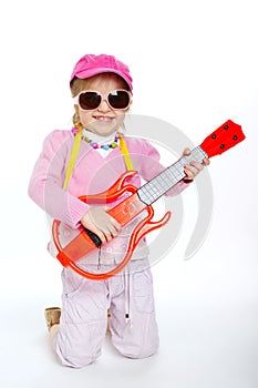 Little girl playing electric guitar hardcore