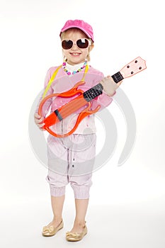 Little girl playing electric guitar hardcore