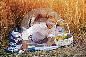 A little girl is playing with her dad