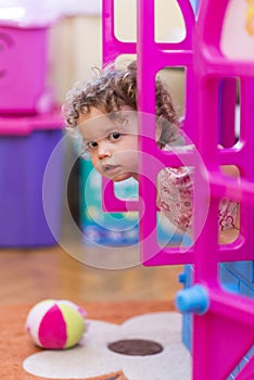 Little Girl Playing At Home