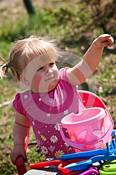 Little Girl Playing Outdoors