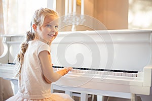 Little girl playing piano