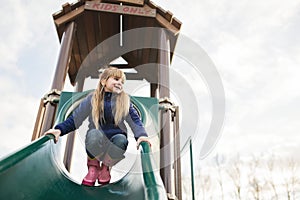 Little girl playing on playground