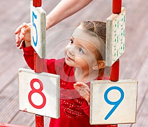 Little girl playing on the playground