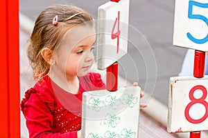 Little girl playing on the playground