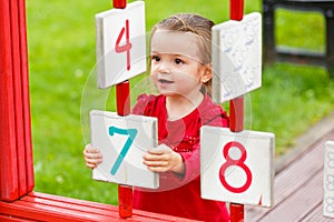 Little girl playing on the playground