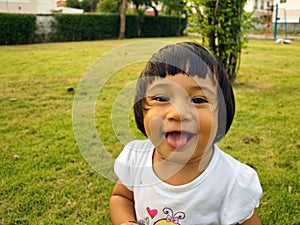 Little girl playing smiling