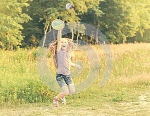 Little girl playing tennis