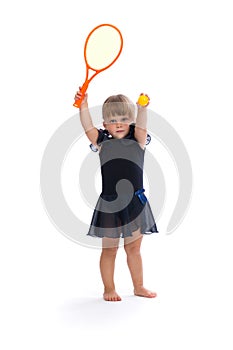 Little girl playing tennis