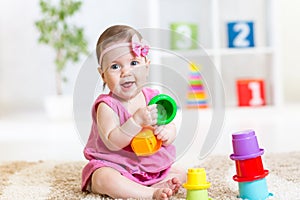 Little girl playing with toys