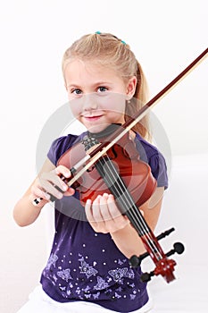 Little girl playing violin