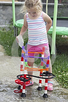 Little girl playing with water