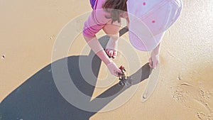 Little Girl Plays on Empty California Beach