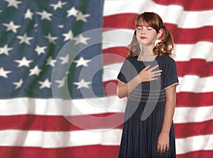 Little Girl Pledging Allegiance to the Flag photo