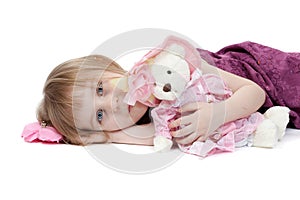 Little girl with plush toy bear