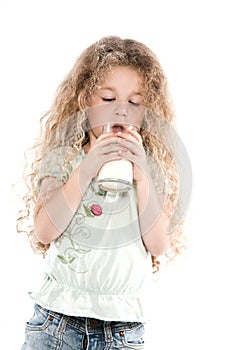 Little girl portrait drinking milk