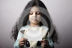 Little girl portrait holding a flash card in hand mock-up series