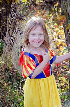 Little girl poses in her halloween princess costume