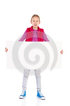 Little girl posing with blank banner.