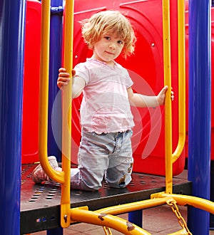 Little girl posing on playground