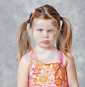 Little girl with pout photo
