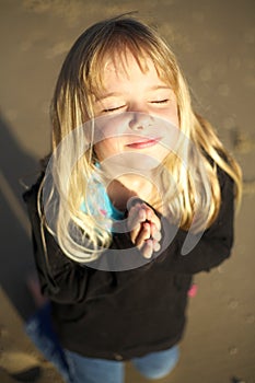 Little girl praying