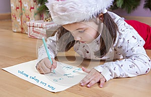 Little girl preparing The Three Wise Men Letter