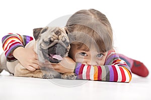 Little girl and the Pug-dog