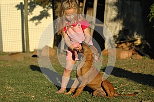 Little girl with puppy