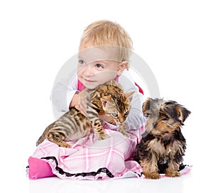 little girl with puppy hugging a kitten. isolated on white background