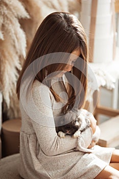 Little girl with the rabbit