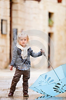 Little girl on rainy day